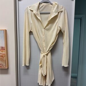 Ribbed tie waist cream colored dress. Size medium. Never worn